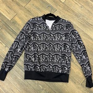 Junior size lace spring jacket.